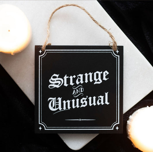 Strange And Unusual Hanging Sign
